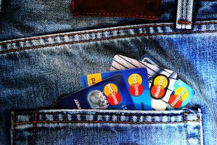 Credit Cards Tucked in Blue Jeans Pocket