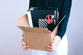 Moving Box Packed With Office Supplies