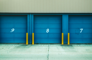 3 Blue Doors of Outside Storage Units
