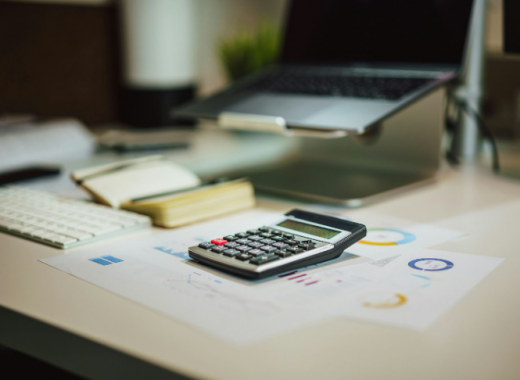 Calculator Sitting on Financial Paperwork