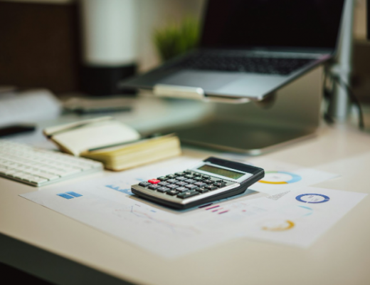 Calculator Sitting on Financial Paperwork