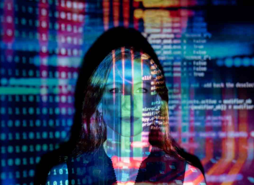 Colorful Code Projected onto a Blonde-Haired Woman