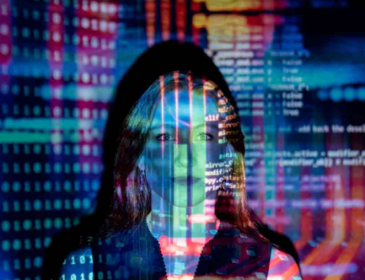 Colorful Code Projected onto a Blonde-Haired Woman