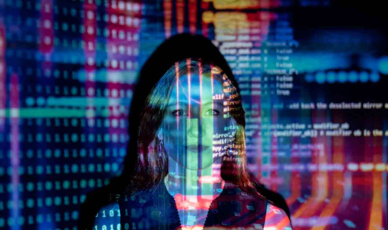 Colorful Code Projected onto a Blonde-Haired Woman