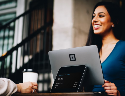 Smiling Woman Interacting with a Customer