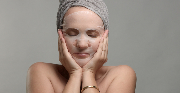 Woman Wearing a Facial Mask for Moisturizing