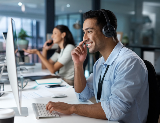 Side Profile of a Smiling Man Talking on a Headset