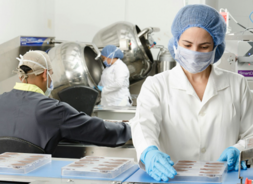 Woman Working in a Healthcare Facility and Wearing a Mask