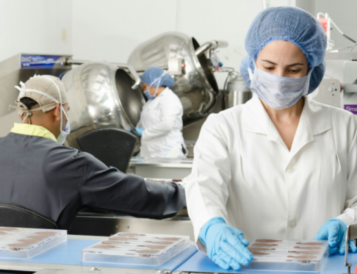 Woman Working in a Healthcare Facility and Wearing a Mask