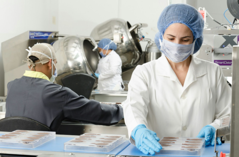 Woman Working in a Healthcare Facility and Wearing a Mask