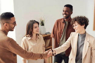 Group of Business People Shaking Hands