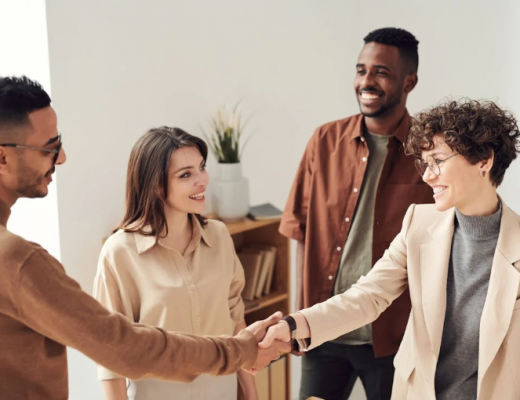 Group of Business People Shaking Hands