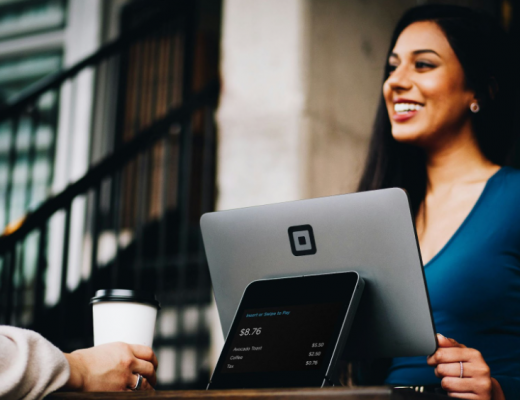 Smiling Woman Providing Customer Service