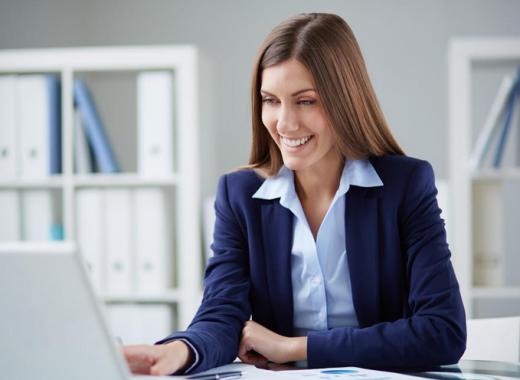Smiling Woman Wearing a Navy Blue Blazer