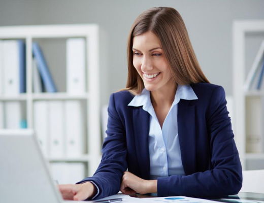 Smiling Woman Wearing a Navy Blue Blazer