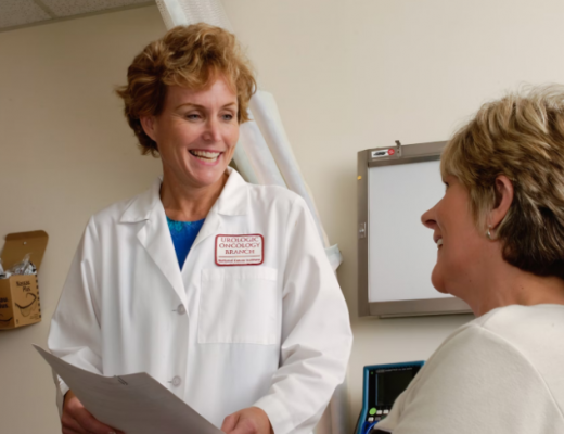 Smiling Female Doctor Smiling at a Patient