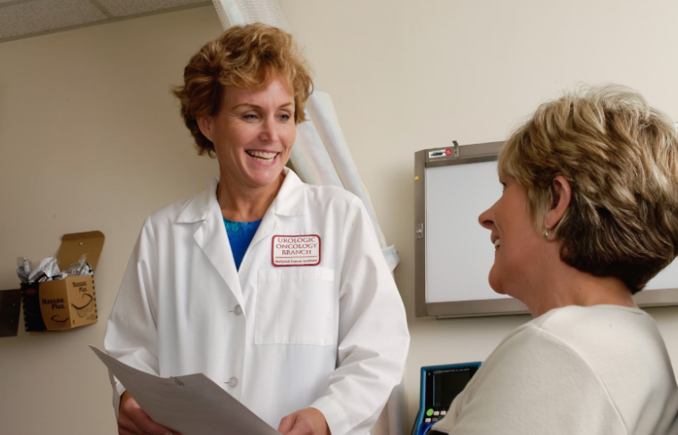 Smiling Female Doctor Smiling at a Patient
