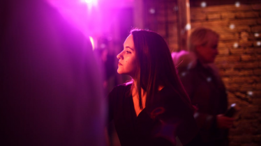 Dark Haired Woman at a Business Event