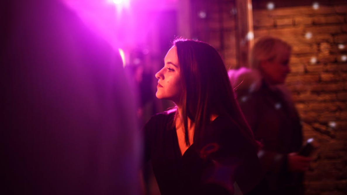 Dark Haired Woman at a Business Event