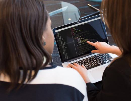 2 Woman Looking at a Laptop Screen
