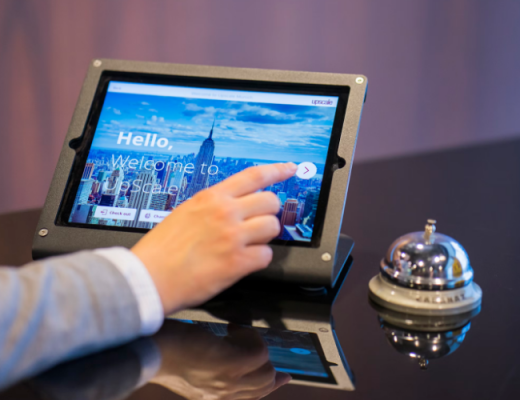 Man Typing on a Touchscreen Tablet