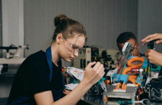 Skilled Female Worker in a Factory