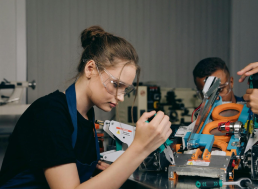 Skilled Female Worker in a Factory