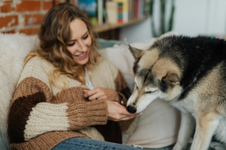 Woman Petting a Dog