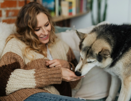 Woman Petting a Dog