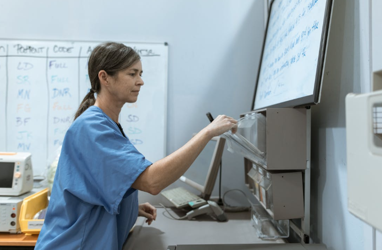 Nurse Technician Standing in a Clinic Room