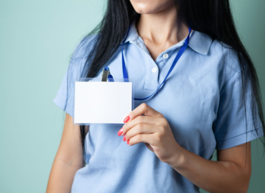 Nurse Standing Up Against a Wall