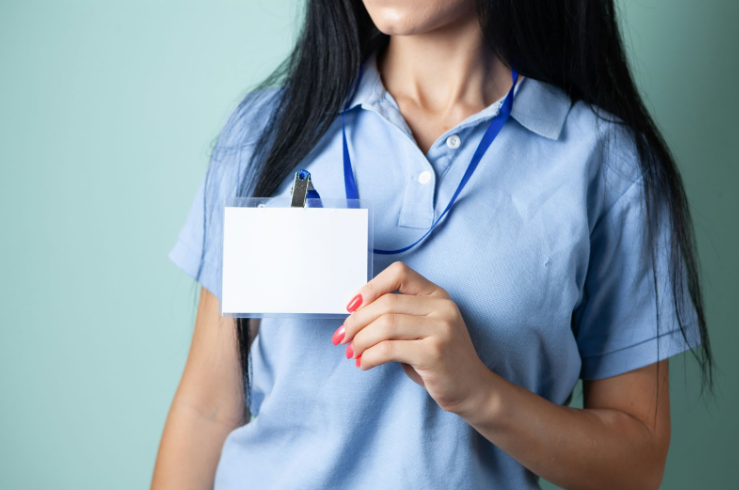 Nurse Standing Up Against a Wall
