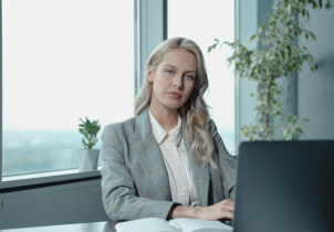 Attractive Woman Wearing a Business Suit