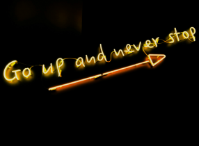 Neon Sign That Says Go Up and Never Stop