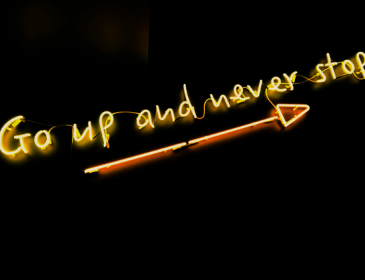 Neon Sign That Says Go Up and Never Stop