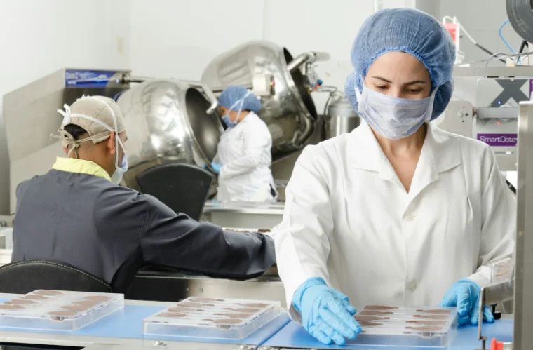 Woman Working in a Healthcare Facility and Wearing a Mask