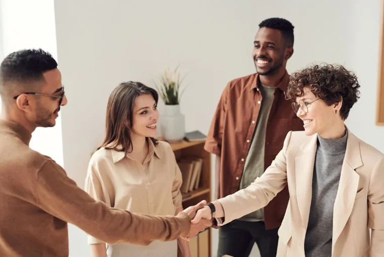 Group of Business People Shaking Hands