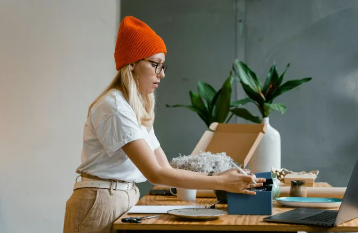 Woman Wearing an Orange Beanie Hat