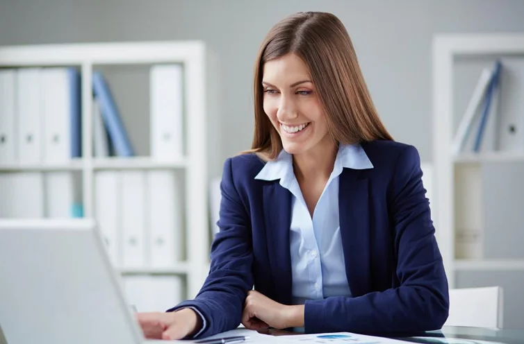 Smiling Woman Wearing a Navy Blue Blazer