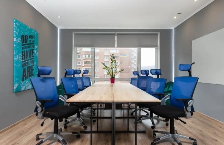 Conference Table with Bright Blue Chairs