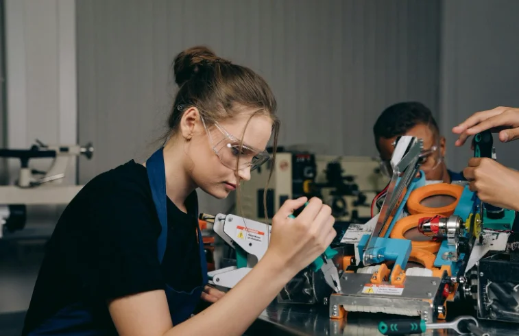 Skilled Female Worker in a Factory